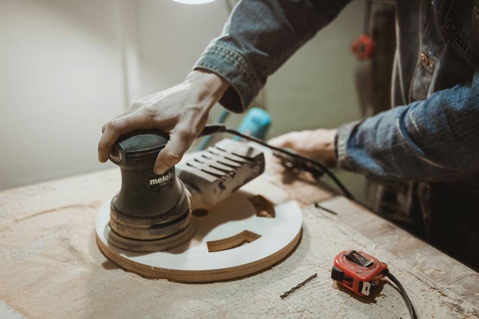 Assorted sanding discs and random orbit sander accessories